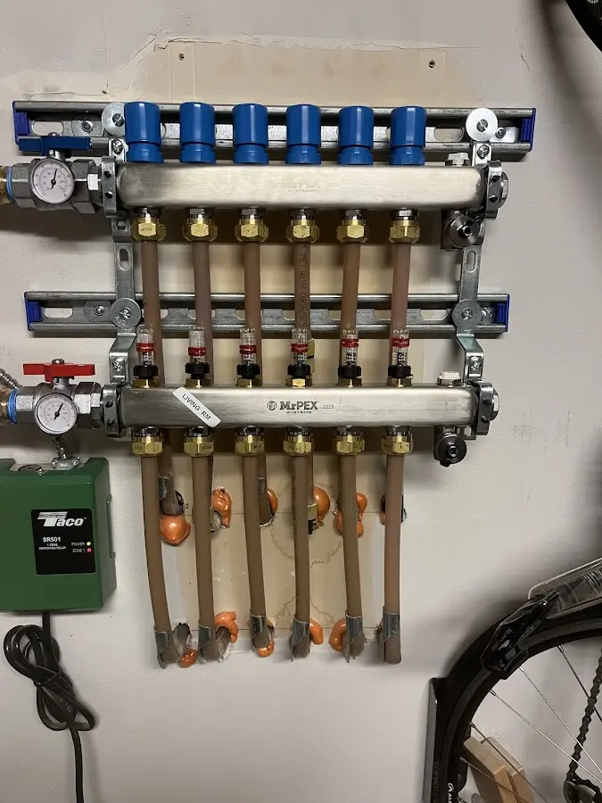 Plumber performing Water Heater Repair at a residential property in Muscatine